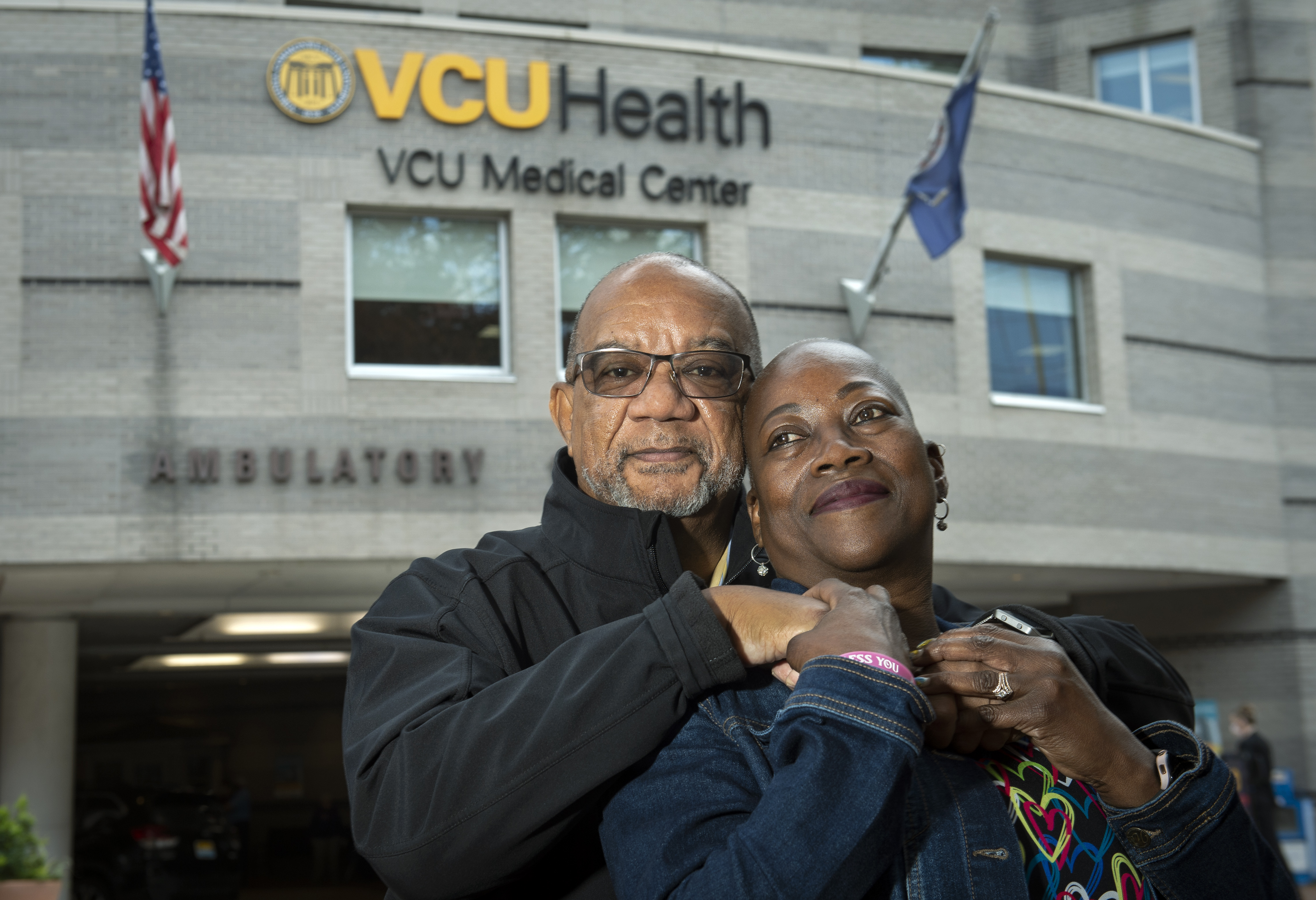 Husband and wife in front of VCU Health Medical Center