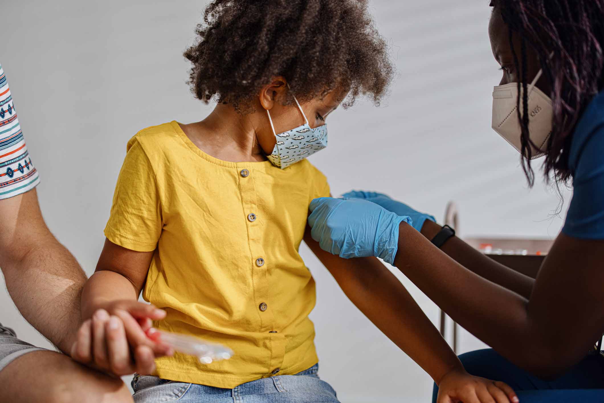 Young child getting vaccinated