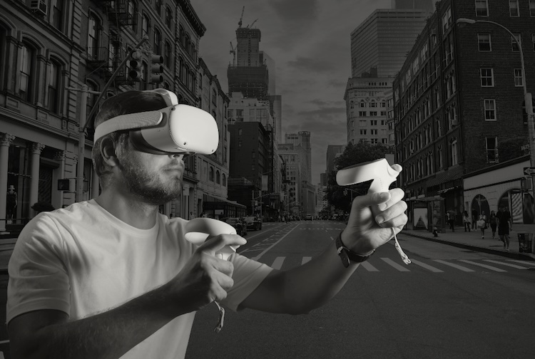 Black and white illustration of a man using a virtual reality headset in a city street.